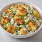 Crispy smashed potato salad with scallions, dill and creamy yogurt dressing.