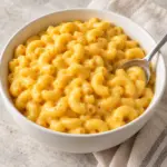 Creamy elbow macaroni in sharp cheddar sauce ready to serve