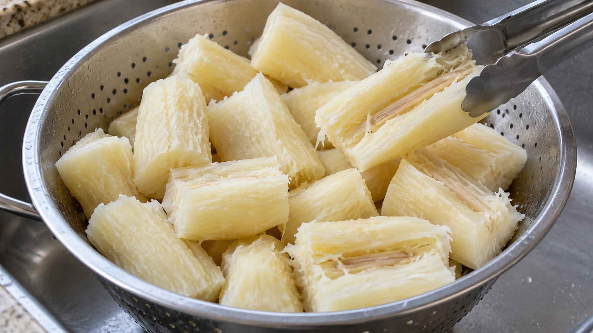 Boiled and drained pieces ready to cut into yuca fries
